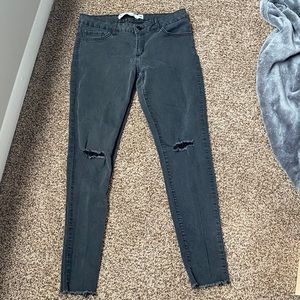 Faded Black Jeans with holes/distressed knees
